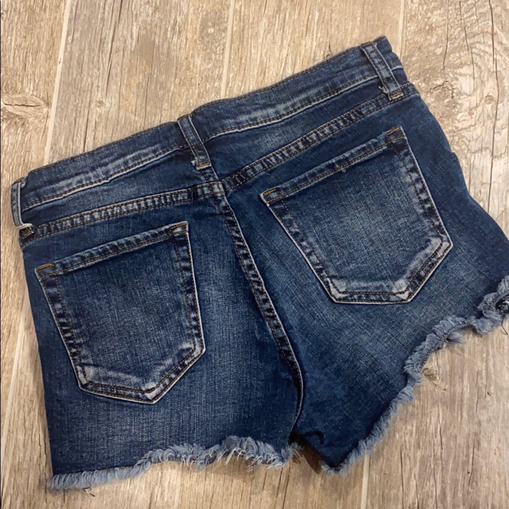 Edyson Distressed Mid Rise Cut Off Shorts - Picture 3 of 5